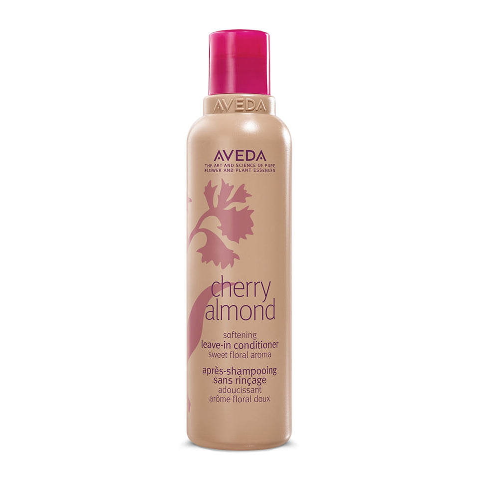 Aveda bottle front view showing label and size, clear branding and benefits