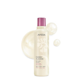 Aveda bottle front view showing Cherry Almond shampoo and soft shine
