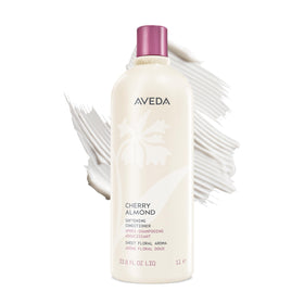 Aveda bottle front view showing Cherry Almond branding and size, highlighting recognizable aroma