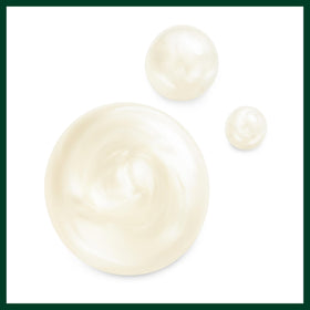 Aveda label close-up showing 97% naturally derived and silicone-free