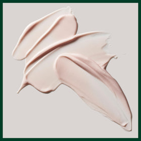 Aveda lotion applied on forearm demonstrating fast-absorbing hydration benefit