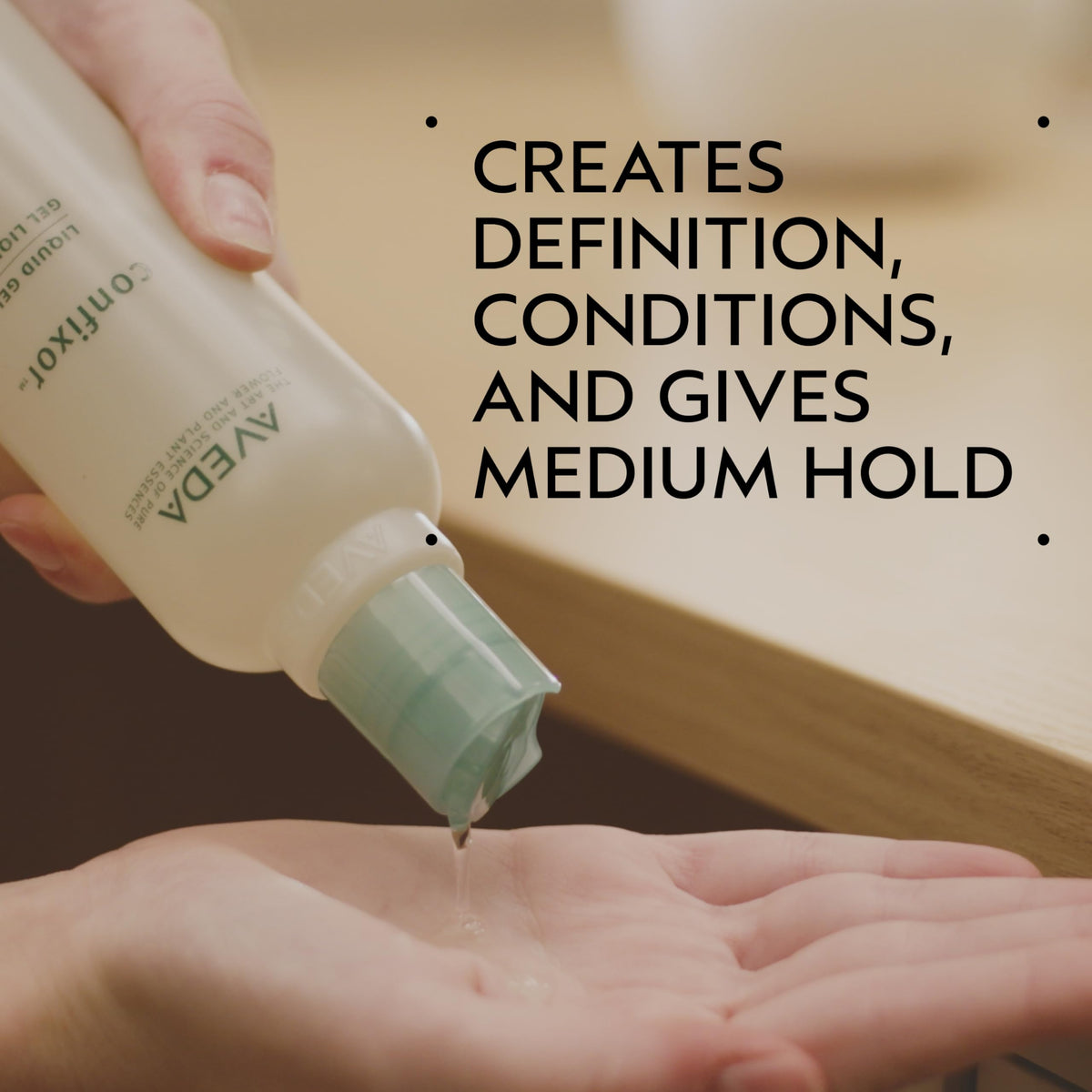 Aveda Confixor pump and label closeup highlighting scent and ingredient transparency benefit