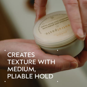 Aveda Control Paste open jar closeup showing balm texture and easy scoop benefit
