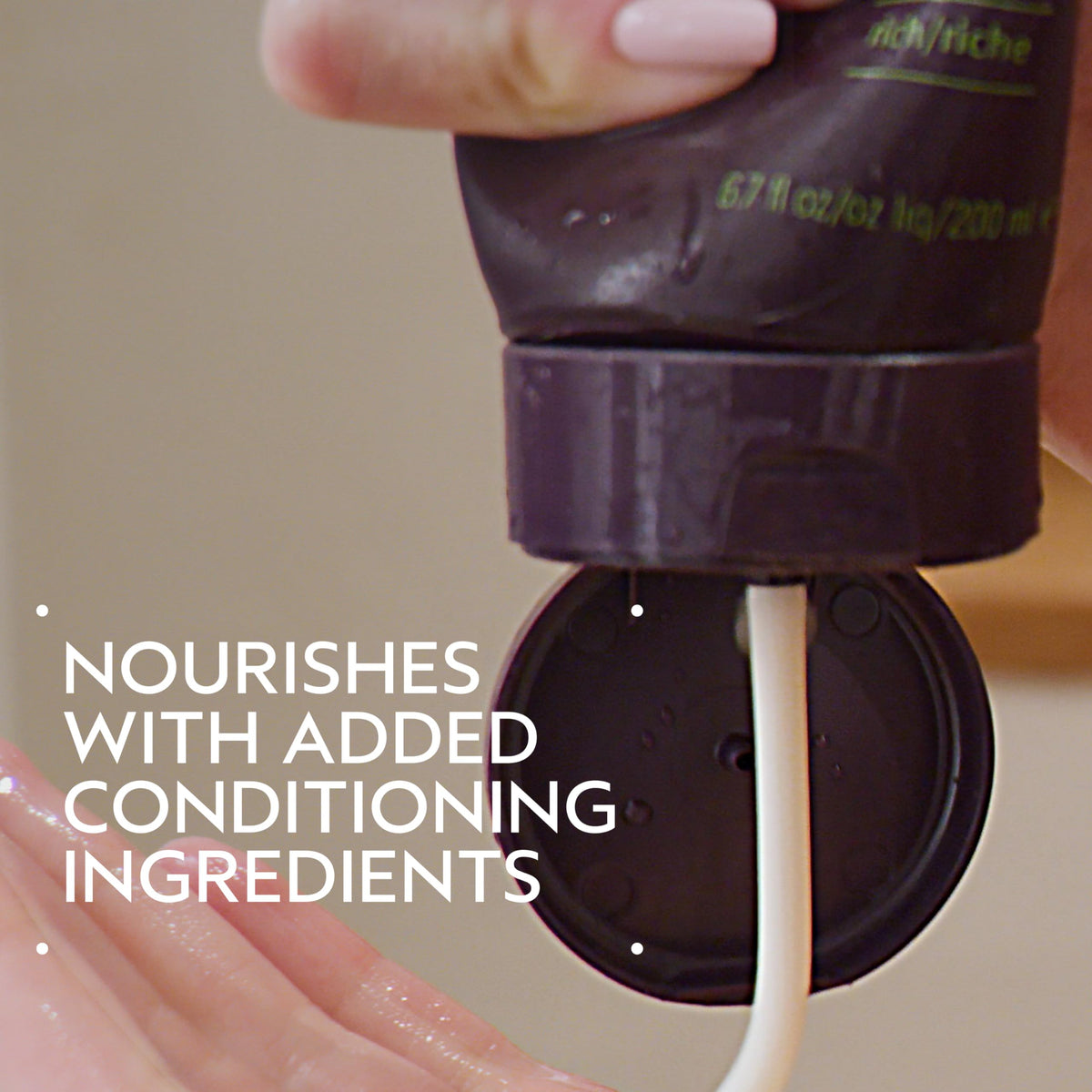 Aveda pump dispenser close-up for easy application and controlled use
