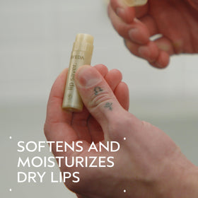 Aveda Lip Saver smooth balm texture close-up highlighting creamy finish and quick absorption benefit