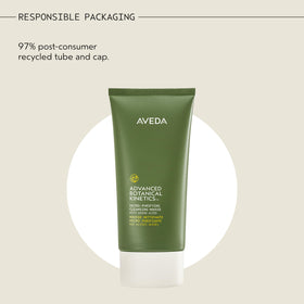 Aveda bottle next to a hand for scale, visualizes the 5 fl oz travel-friendly size