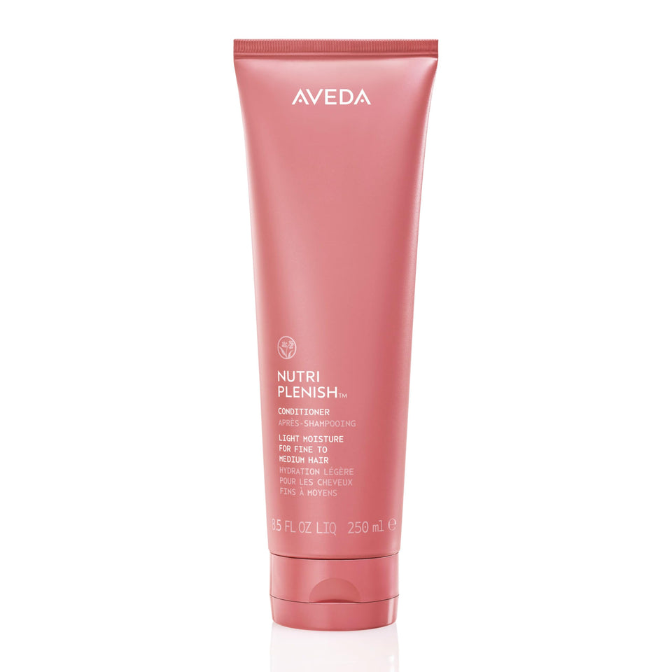 Aveda bottle front view showing brand and light moisturizing benefit