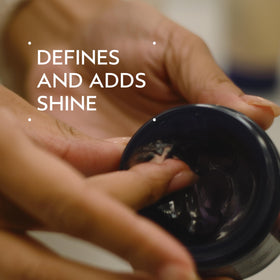 Aveda pomade texture close-up demonstrating creamy humectant consistency
