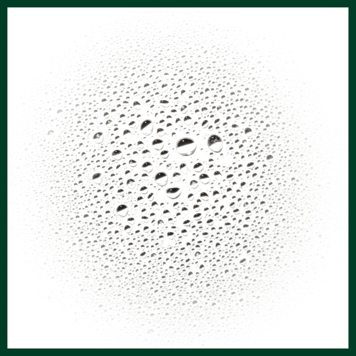 Aveda spray applied to parted hair demonstrating targeted oil control