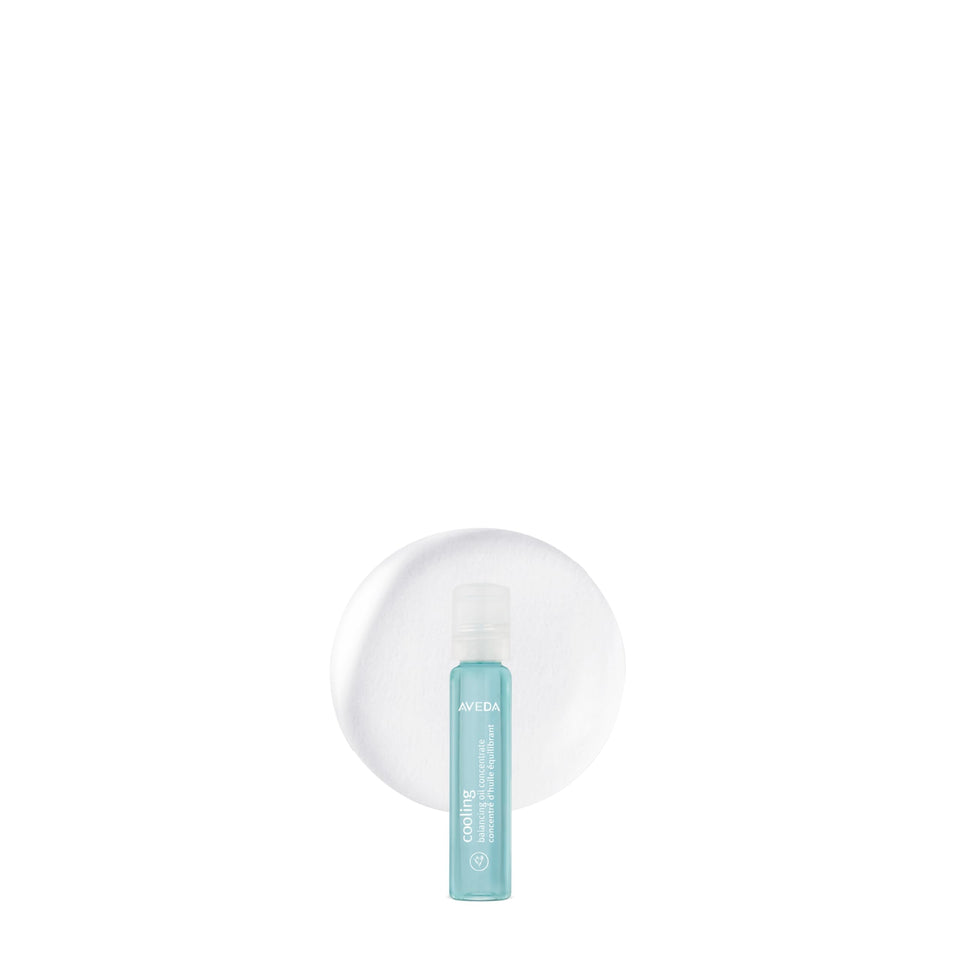 Aveda rollerball front packaging showing compact size and branding for travel convenience