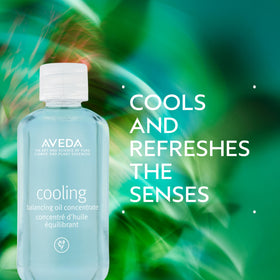 Aveda rollerball applicator close-up highlighting the smooth metal ball for effortless glide