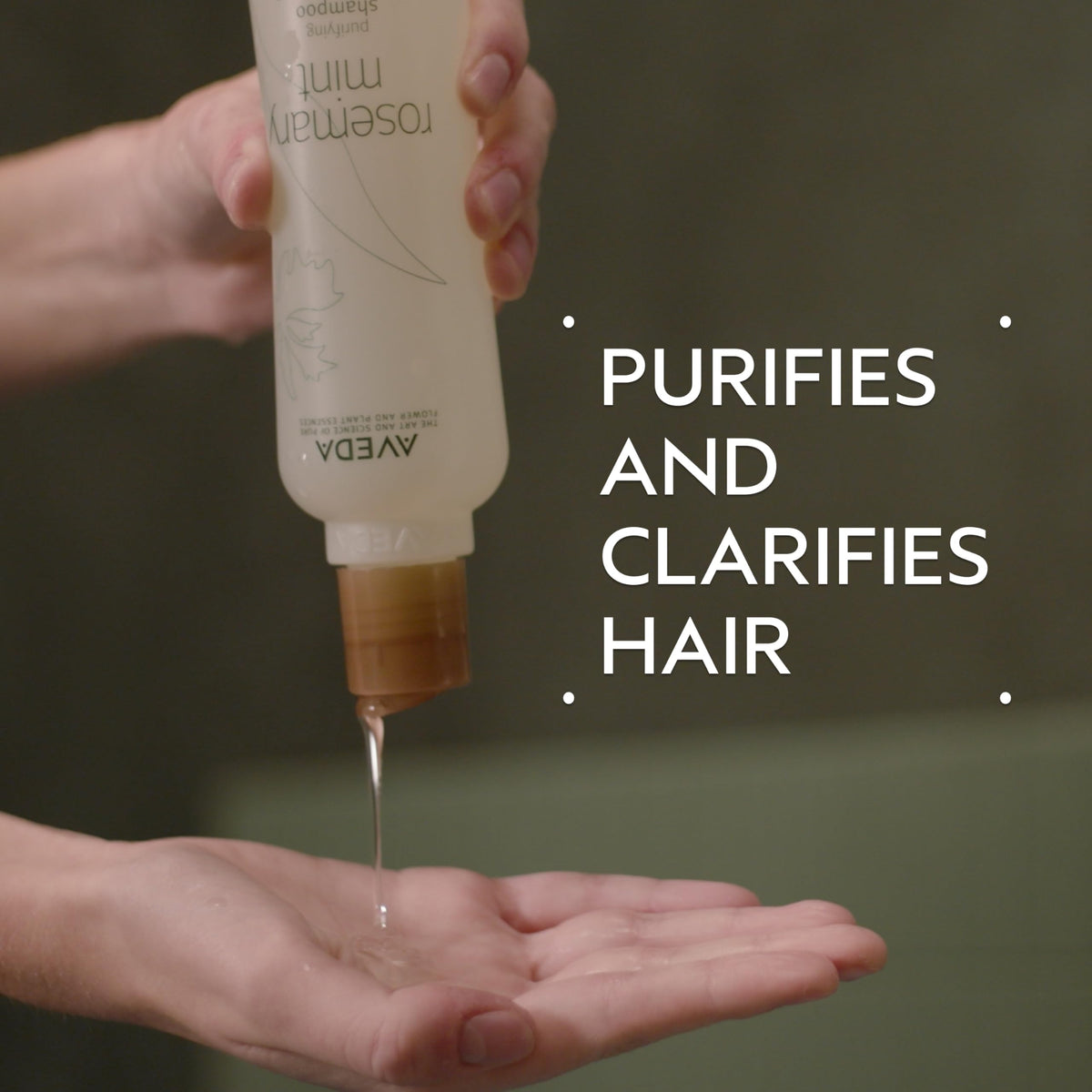 Close-up of Aveda pump bottle dispensing shampoo for easy, mess-free use