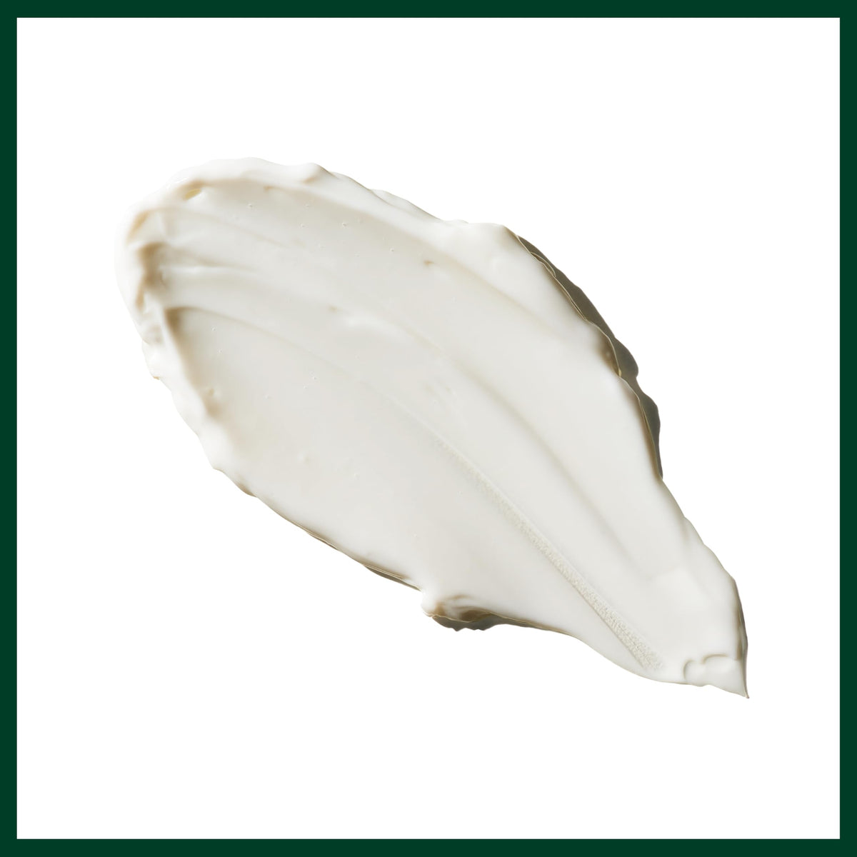 Fresh botanicals beside Aveda jar emphasizing plant-derived ingredient benefit