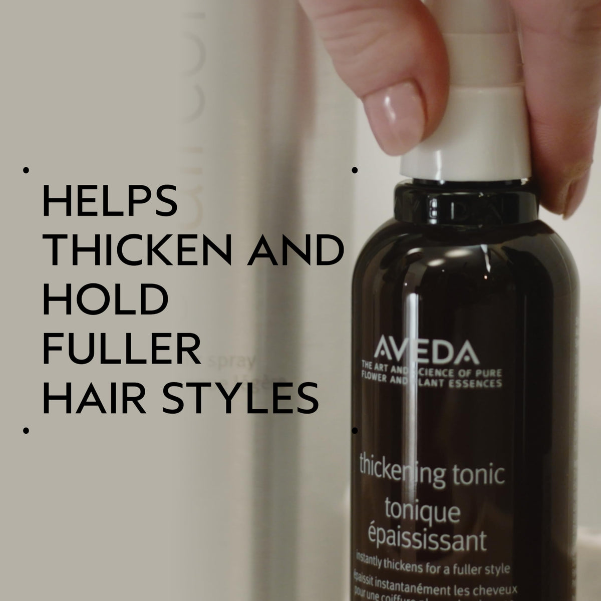 Aveda Thickening Tonic spray mist in motion demonstrating even lightweight application
