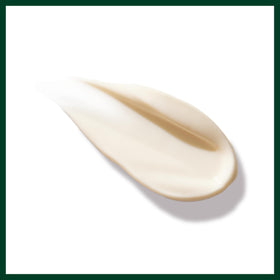 Aveda Tulasara jar open with visible label, showing ingredient transparency and benefits