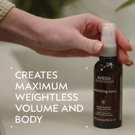 Aveda mist spray in action demonstrating even coverage and root lift