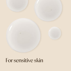 Aveeno application with hand smoothing serum on face for instant comfort benefit