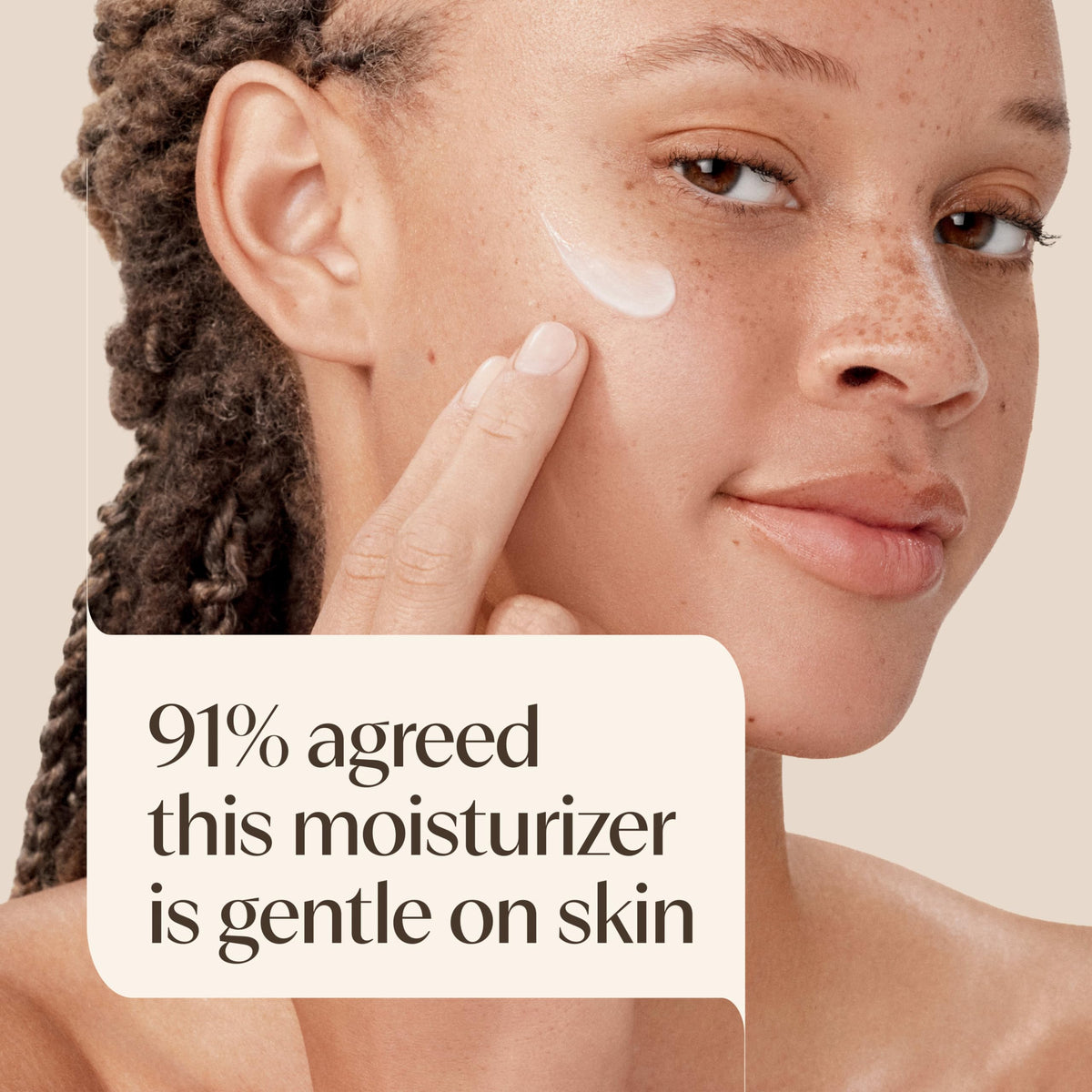 Applying Aveeno moisturizer to cheek for easy daily protection