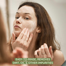 Aveeno lather in hands demonstrating soft foam and easy rinse