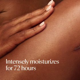 Aveeno bottle label detail highlighting Triple Oat and shea butter benefits