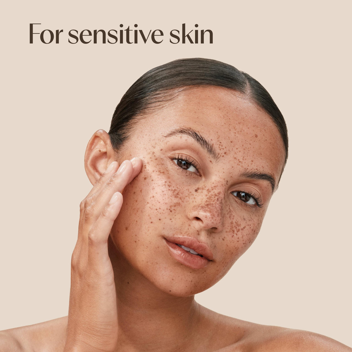 Aveeno label close-up highlighting ceramide and vitamin B5 benefits