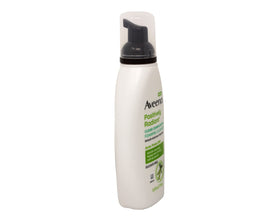 Aveeno bottle in hand showing 6 oz scale and portability