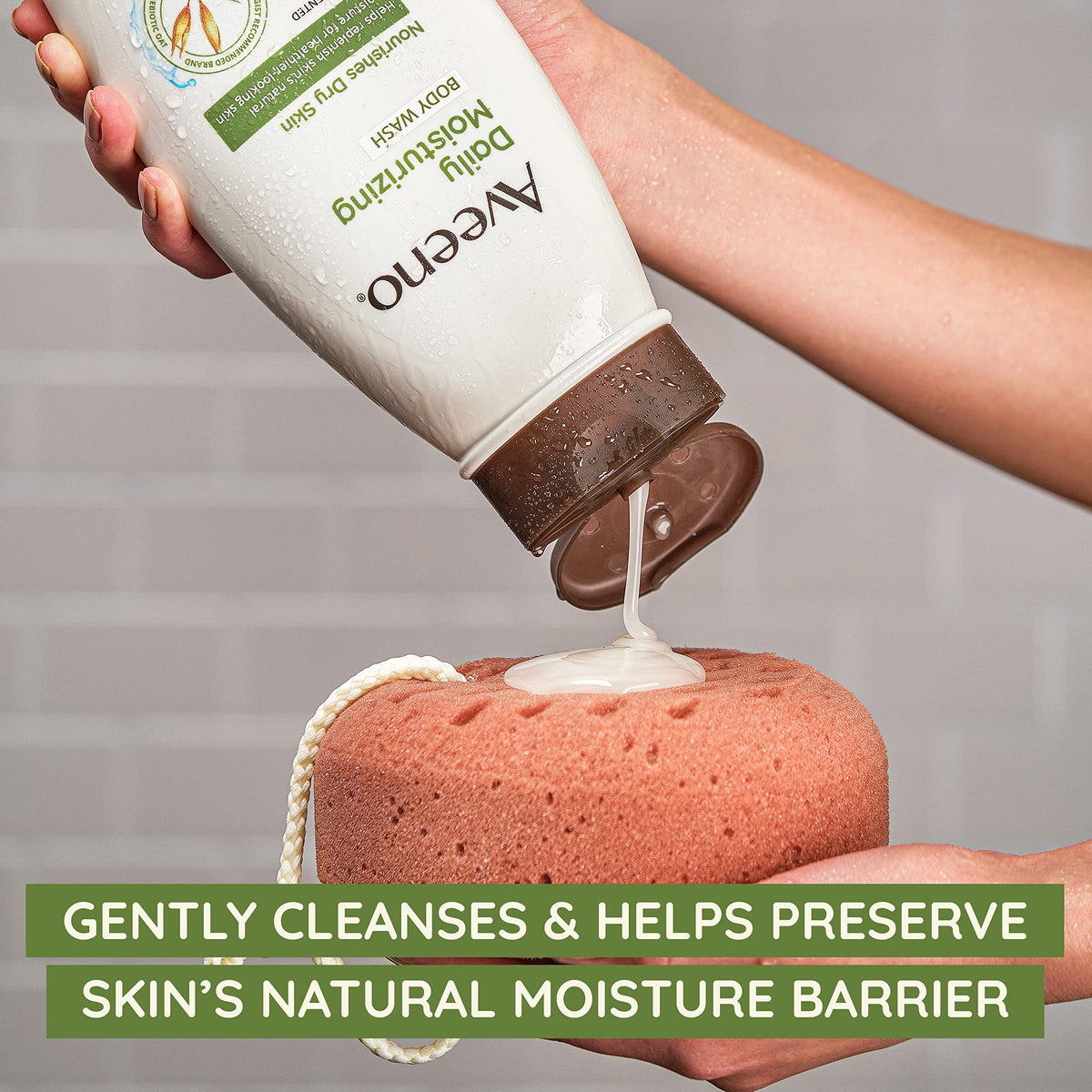 Aveeno body wash in use on arm showing gentle cleansing benefit
