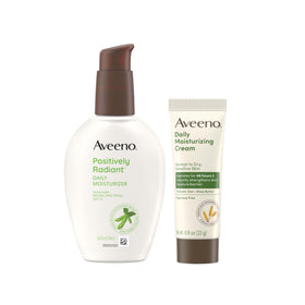 Aveeno packaging front showing Positively Radiant SPF 15 and travel cream benefits