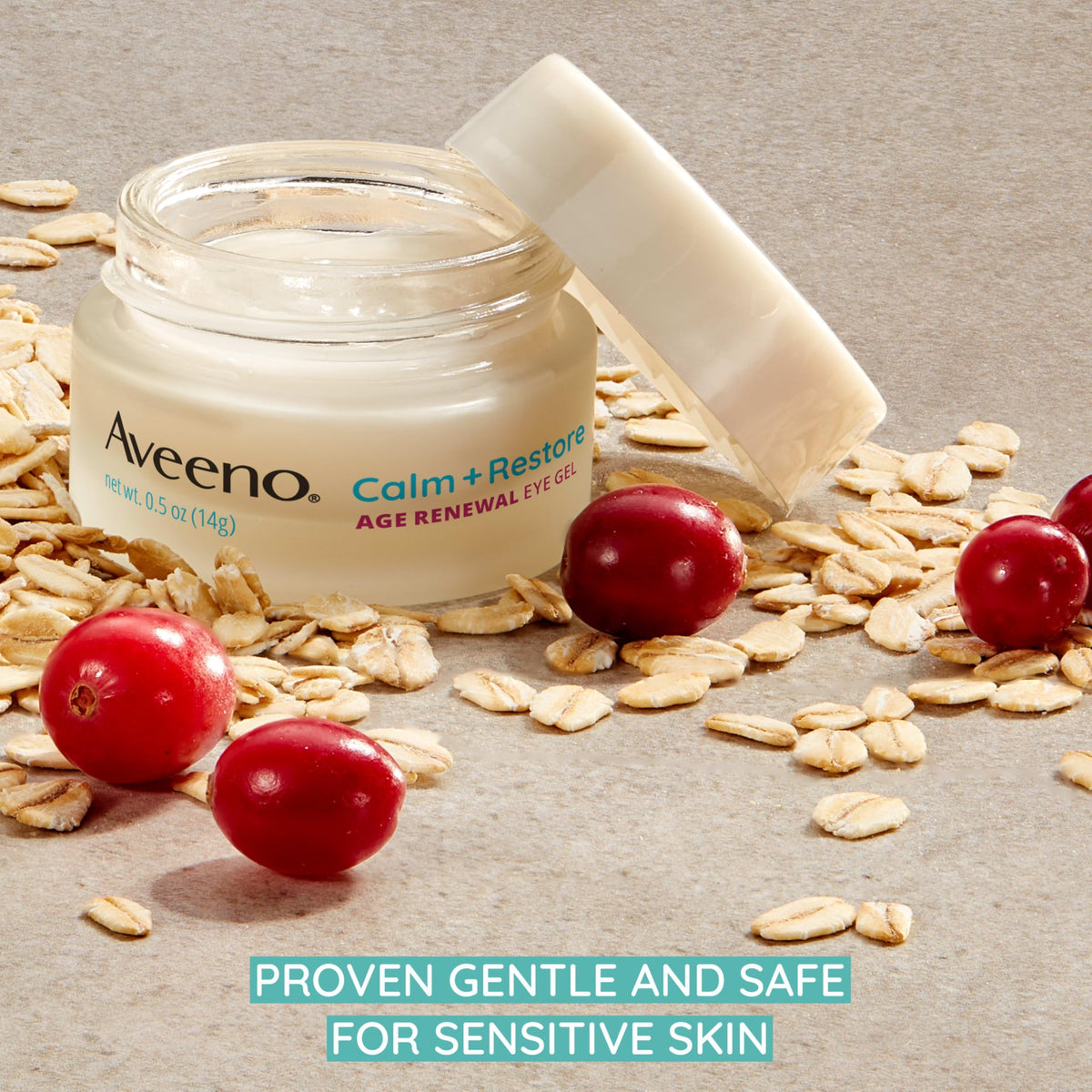 Aveeno 0.5 oz jar next to coin to show compact size and portability