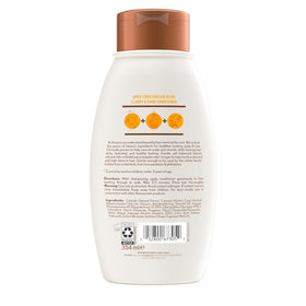 Aveeno bottle beside common size for scale showing 12 oz volume