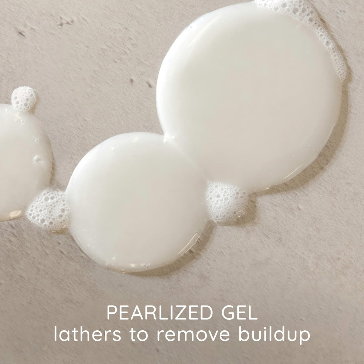 Aveeno shampoo texture foam close-up showing gentle lather
