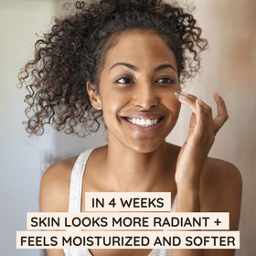 Aveeno travel moisturizing cream tube close-up highlighting oat and shea butter