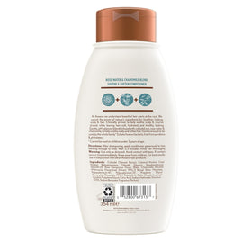 Aveeno 12 fl oz bottle next to travel size, showing size and portability benefits