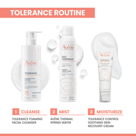 Hand holding Avène bottle for scale to show travel-friendly size