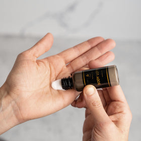 Avistar product next to a credit card illustrating compact travel size