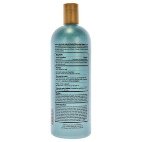 Avlon Kera Care shampoo in hand to show 32 oz scale, highlights moisturizing benefit