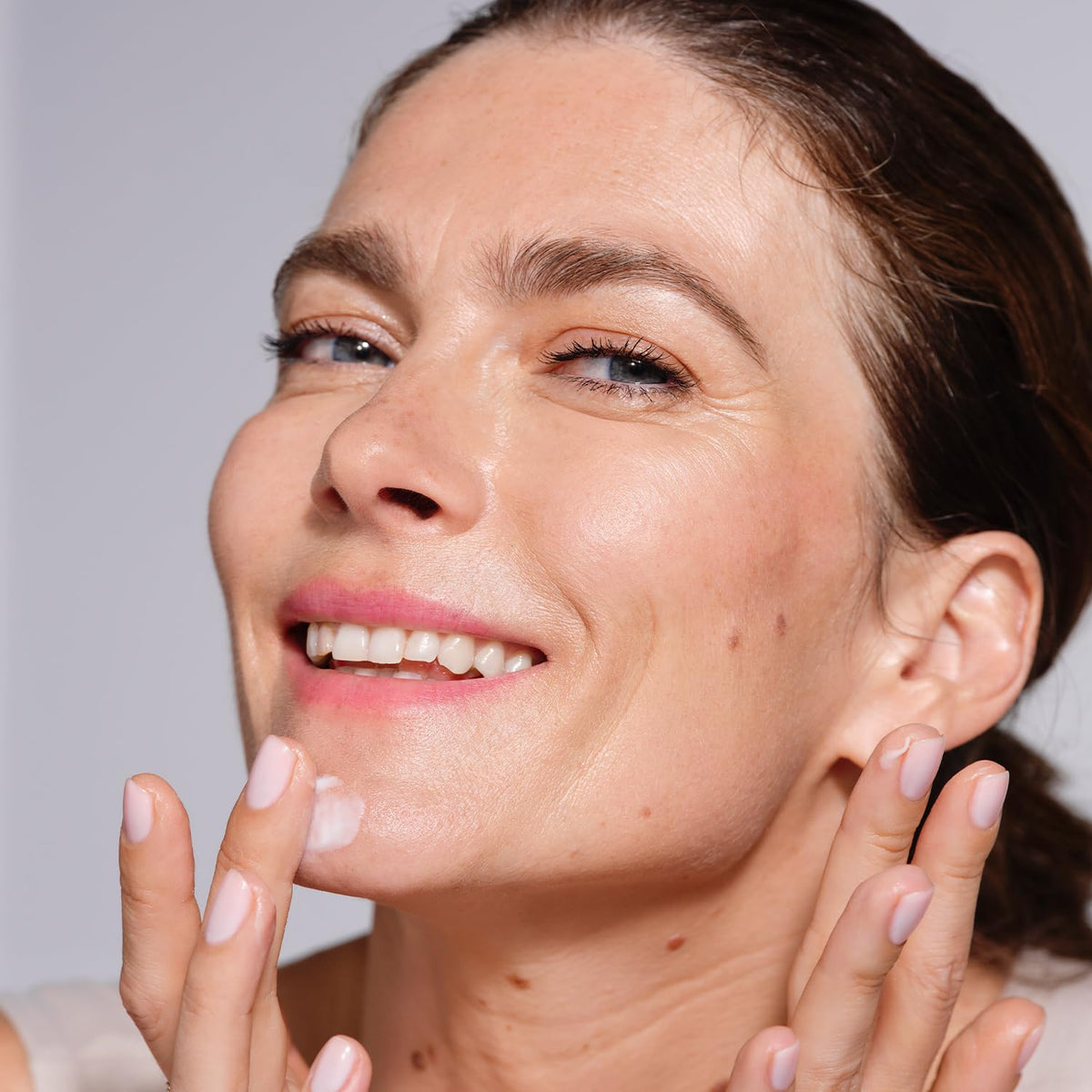 AVON Anew jar on bathroom counter in morning routine setting