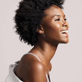 AVON applied to jawline and neck illustrating firming support while sleeping