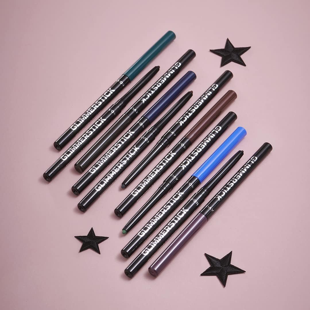AVON Glimmerstick held in hand indicating compact travel-friendly size