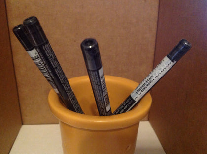 AVON Glimmersticks front packaging showing rich black shade and bulk value