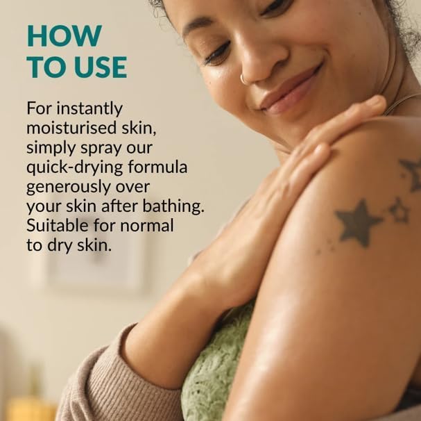 AVON SKIN SO SOFT bottle held in hand showing size and travel-friendly benefit