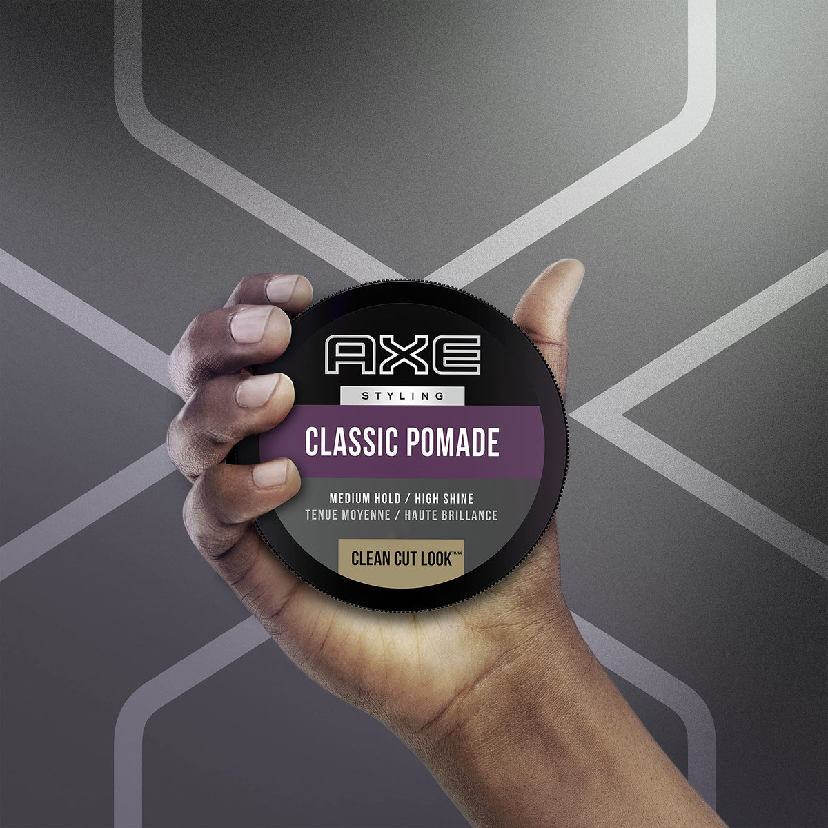 AXE fingertip applying pomade shows quick application and controlled styling