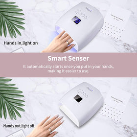Ayshone in-use shot with hand under lamp demonstrating automatic infrared sensor and hands-free curing