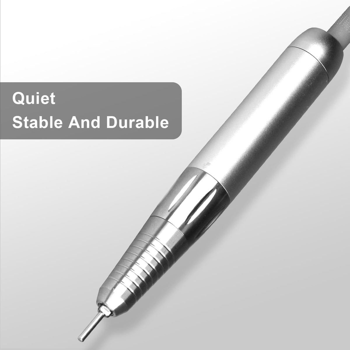 AZ GOGO handpiece next to a coin for scale, showing compact portable size