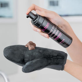 B.TAN mousse in use on leg showing easy blending benefit