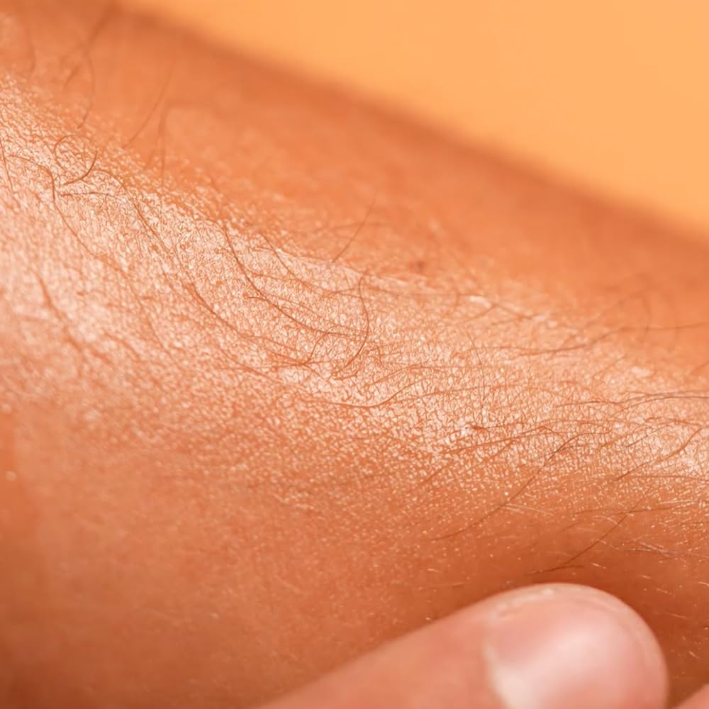 Babaria gel applied on forearm before sun illustrating uniform coverage benefit