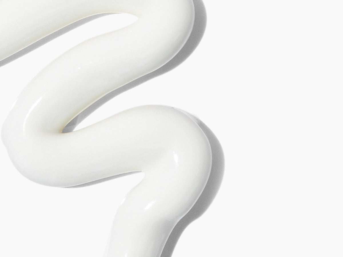 Babo Botanicals lotion texture close-up illustrating lightweight spreadability
