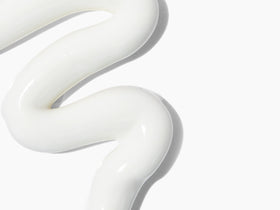 Babo Botanicals lotion texture close-up illustrating lightweight spreadability