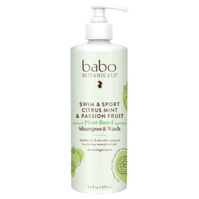 Babo Botanicals 16 fl oz bottle in hand showing scale and travel-friendly size