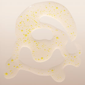 BABOR applying ampoule to face to boost radiance and even tone